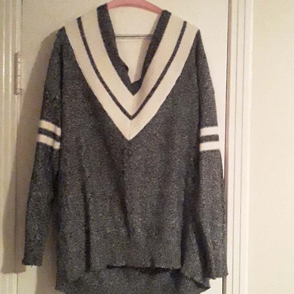 Deep v front, crisscross back sweater